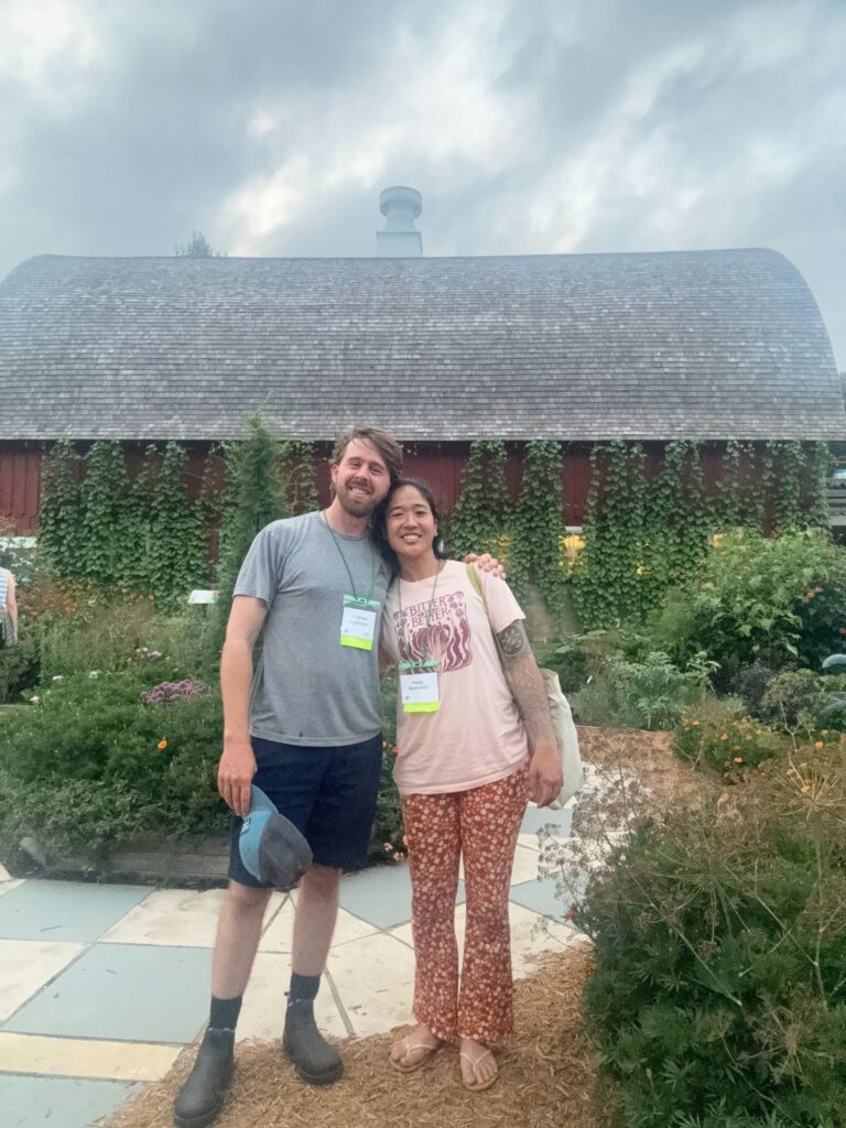 Haley McKinnon, and her brother, Matthew, share a moment in Diane’s Garden at Heritage Farm.